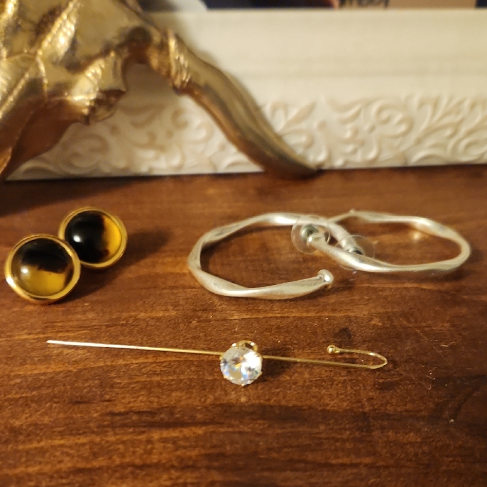 2 sets of earrings and 1 ear cuff